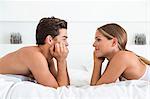 Couple Face to Face in Bed
